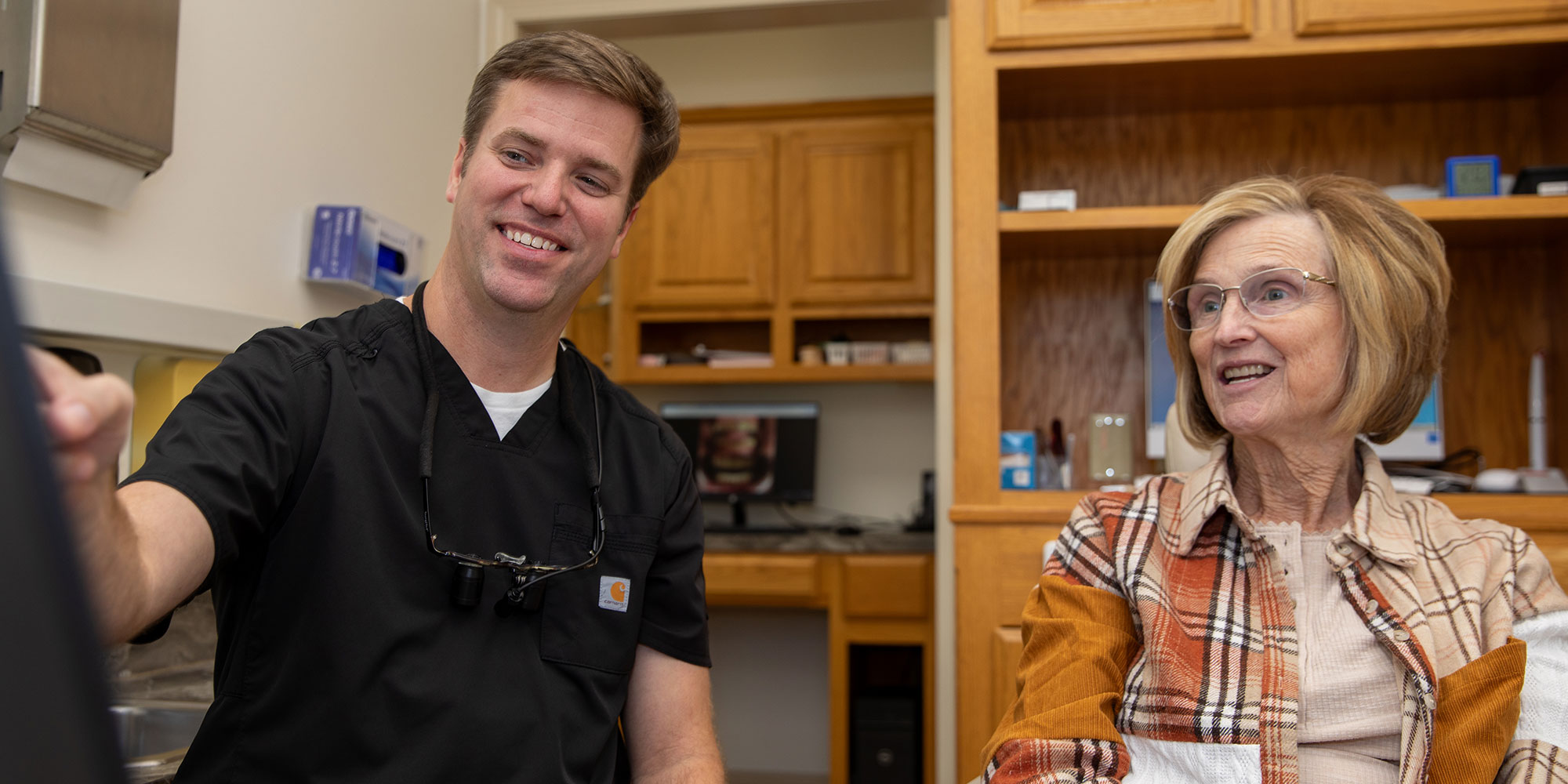 lady with doctor for dental crowns