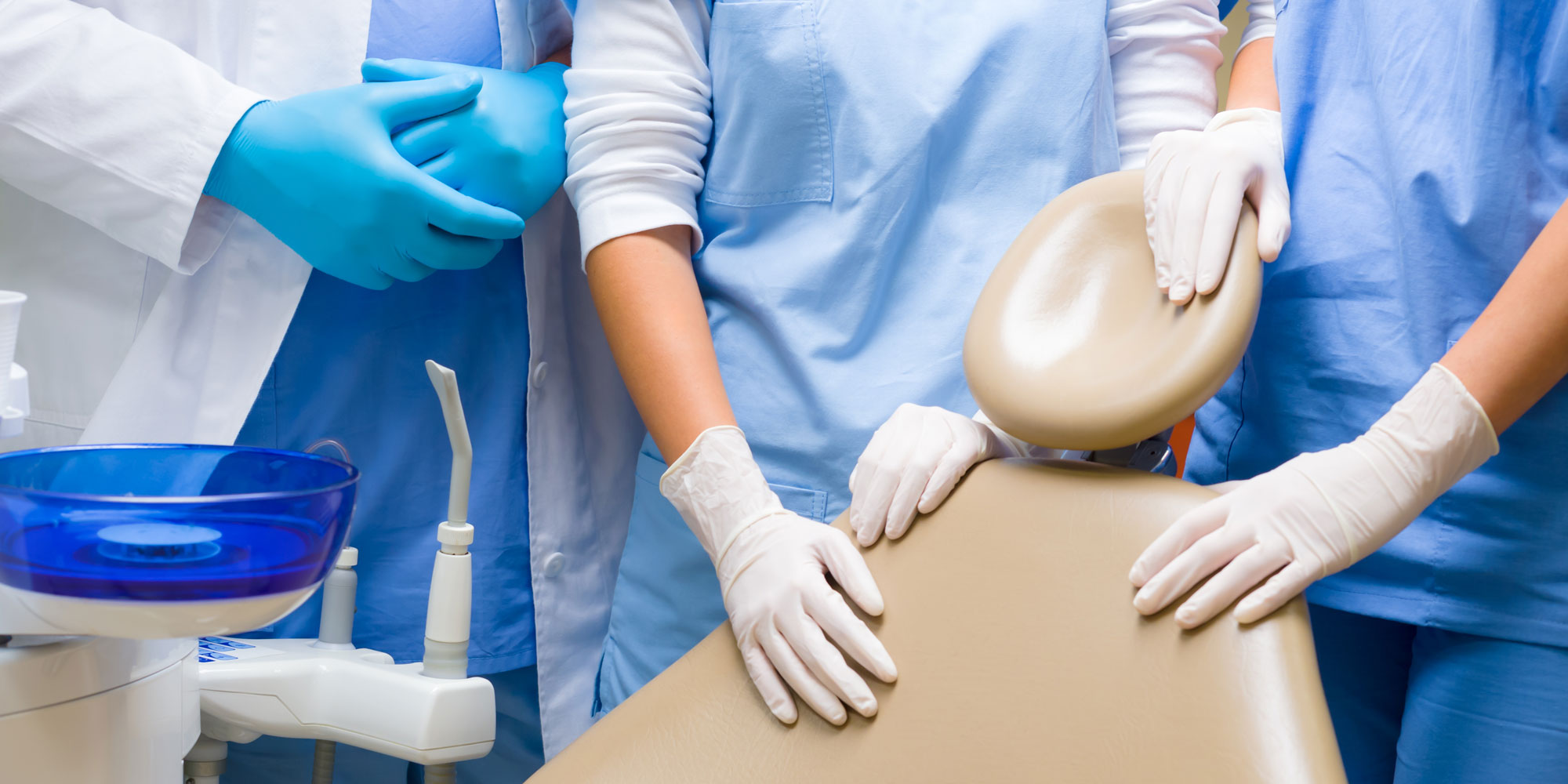 dental team with chsir