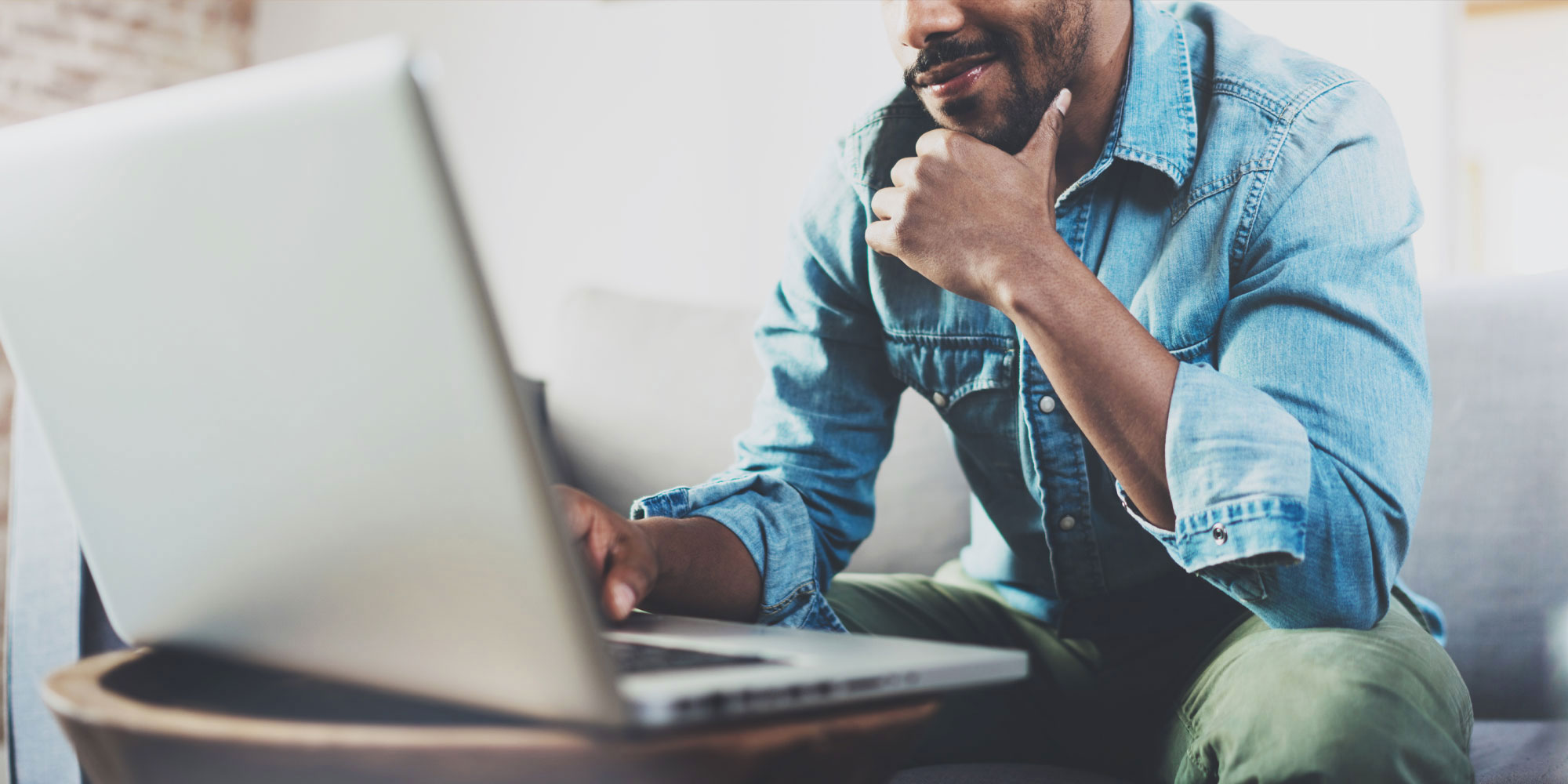 man looking over policy