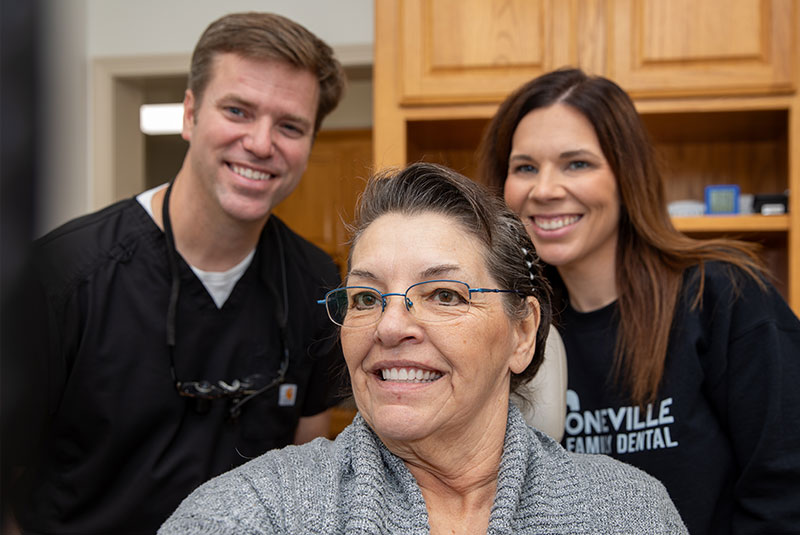 team to see new smile together